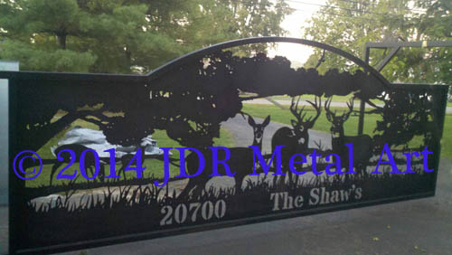 Front entry gate with deer wildlife silhouettes made with a plasma cutter.
