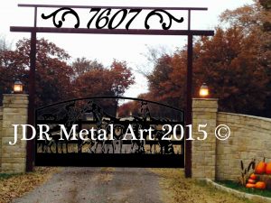 Oklahoma city driveway gates featuring horses dogs fence metal art silhouettes.