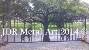 Missouri driveway gate with plasma cut tree and horse design made into metal art.