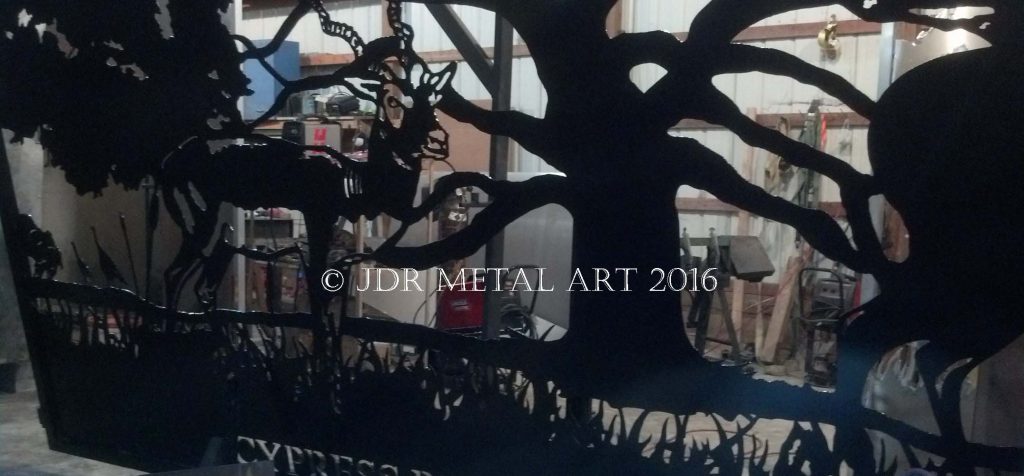 This is a plasma cut silhoutte of an antelope on a driveway gate.