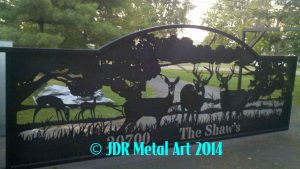 Driveway entrance gate idea with metal art deer wildlife silhouettes.