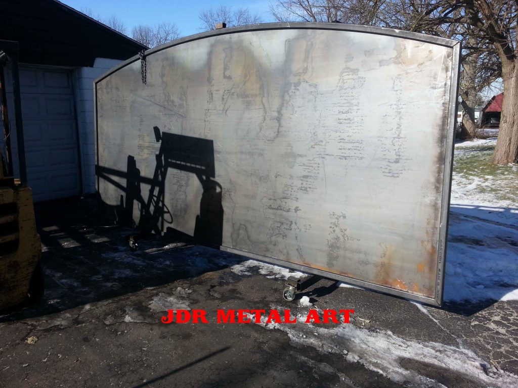 Image of arched driveway gate for metal art silhouettes.