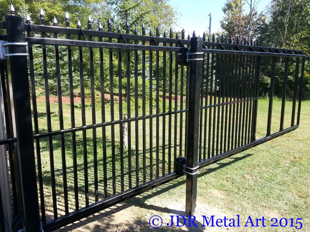 View from the inside of the property looking at the back side of the automated security gate.