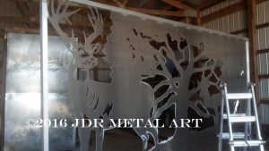 Metal art driveway gates we plasma cut from marine grade aluminum for Orlando Florida residence.