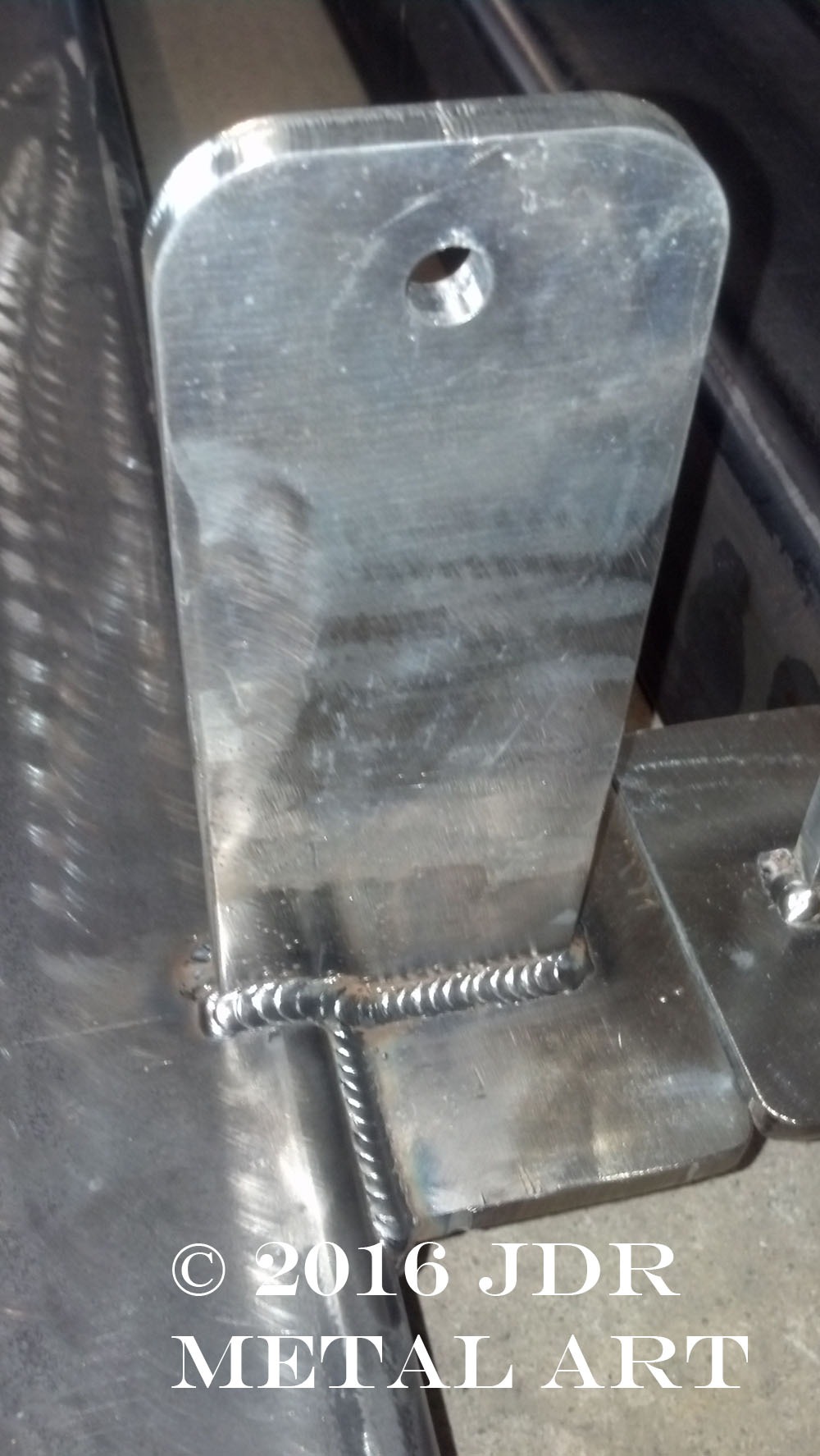 Entrance gate post made from 6x6 square tubing steel with 1/4" wall thickness.