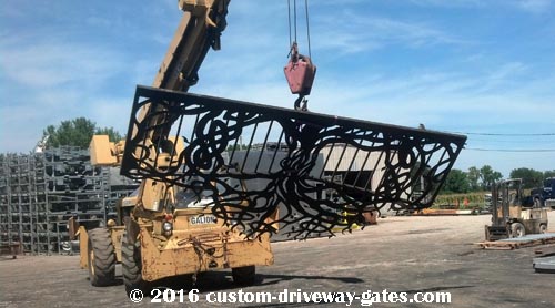 driveway-gate-being-lifted-with-crane