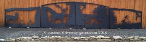 Decorative driveway gates with deer, dog and pheasant theme plasma cut for Marion Ohio drive entry.
