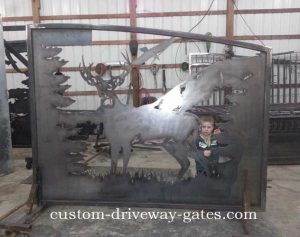 Decorative deer driveway gate plasma cut by JDR Metal Art.