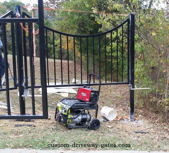 Installing fence panels at Louisville KY residence.