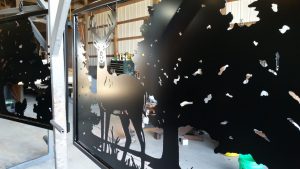Custom Maryland entry gate with deer silhouette design.