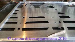 Aluminum driveway gate with design of horses for home in Los Angeles.