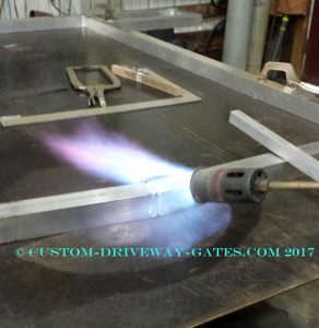 Aluminum Welded Gate being preheated by JDR Metal Art 2017
