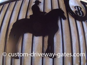 Friesian horse driveway gate design made from aluminum and powder coated.
