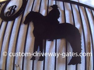 Friesian silhouette cut from metal for driveway gate design by JDR Metal Art.