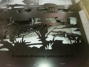 Alligator themed driveway gate silhouette