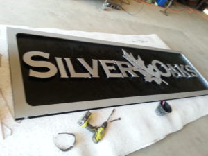 Aluminum sign with plasma cut letters.