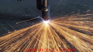 Here is a plasma cutter that is cutting a metal sheet.