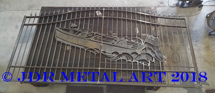 Custom boat themed metal driveway gates built by JDR Metal Art.