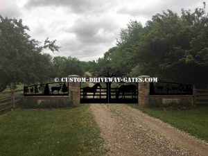 Driveway gates in Indianapolis, Indiana with custom wildlife scene and grazing horses. plasma cut by JDR Metal Art in summer of 2018.
