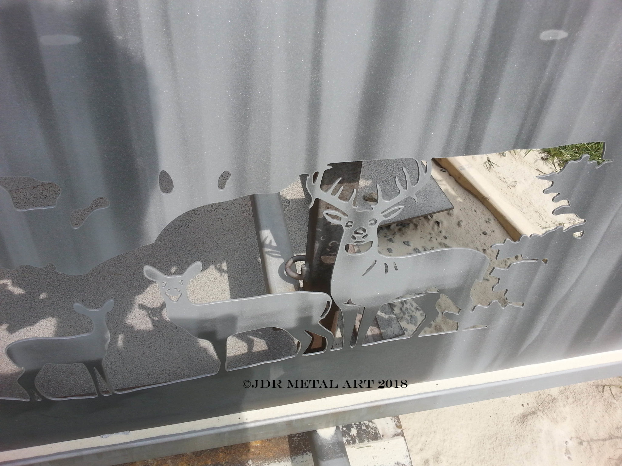 deer entry gate in process of sandblasting 1