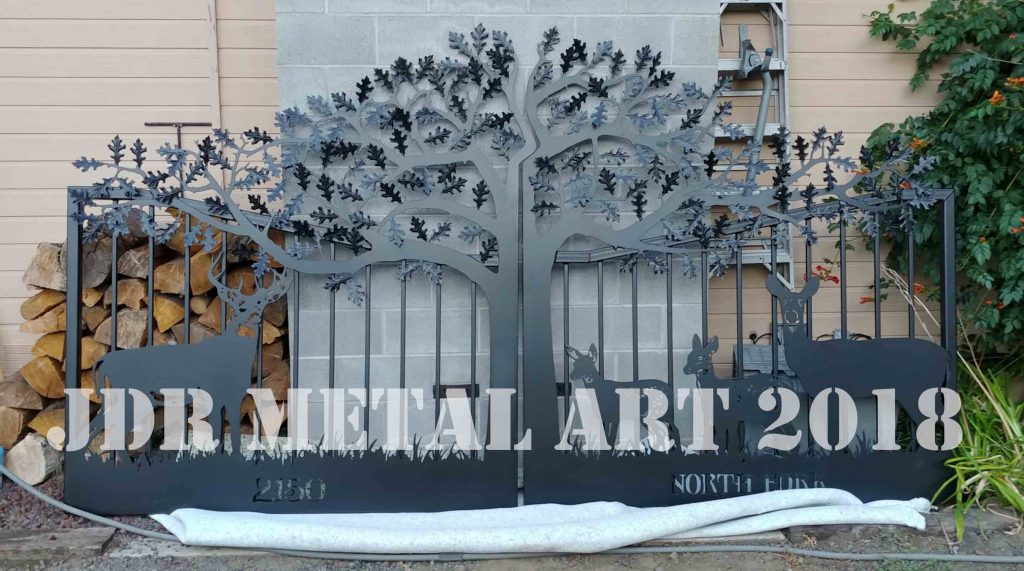 Metal gates with tree for Washington home.