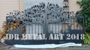 Washington decorative gates with tree and wildlife theme.