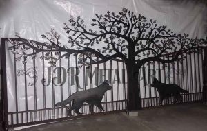 Iron Gates with German Shepherds & Tree
