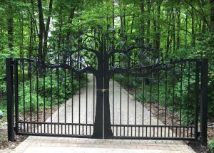 Driveway gate with tree design by JDR Metal Art.