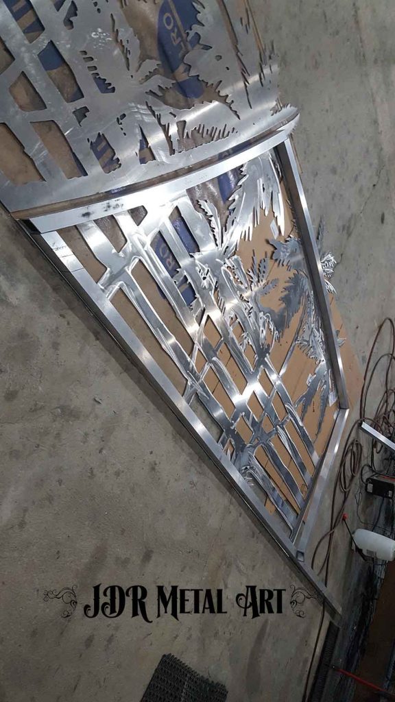 Dual swing aluminum driveway gates 16' wide during layout of frame.