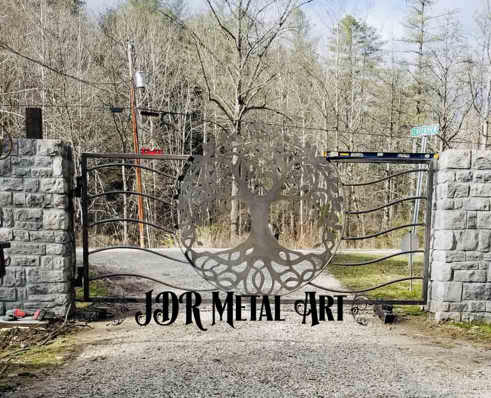 Metal driveway gate by JDR Metal Art installed in Lexington, Kentucky.
