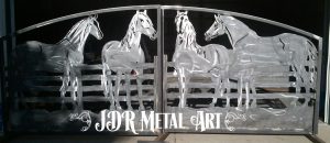 Gates with horse design for driveway entrance, four board fence railing crafted into metal art from a sheet of metal with a plasma cutter..