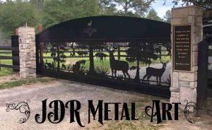 Florida driveway gates with sliding deer and cypress gate design.