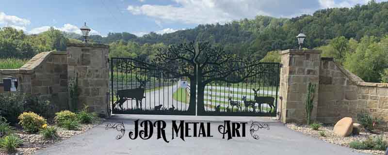 Driveway gates with deer family at Tennesee driveway entrance.