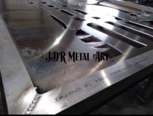 aluminum driveway gate on welding table