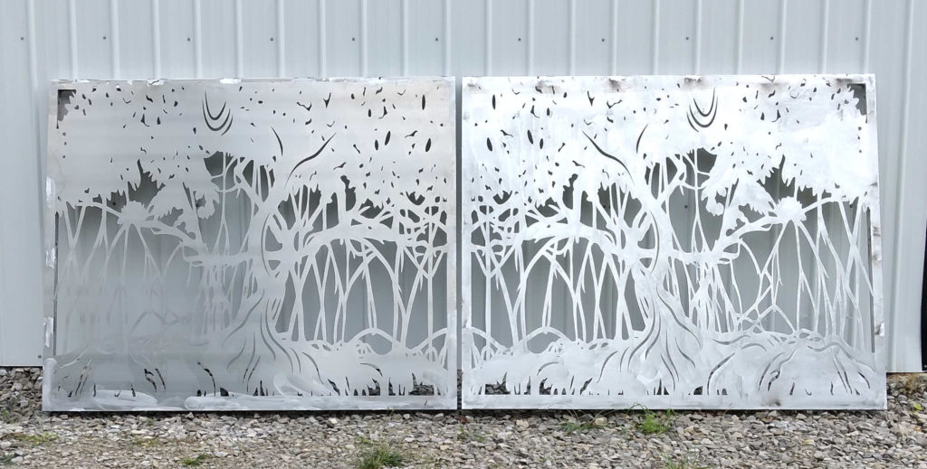 Laser cut aluminum gates with mangrove silhouette