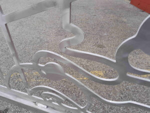Aluminum scroll driveway gates made from metal with scrollwork design for Estero Florida residential community.