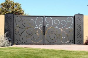Driveway gate design idea with scrolls laser cut or plasma cut from steel or aluminum sheet or plate metal, swinging style gate.