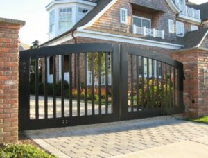 Driveway gate and metal driveway gate design idea with arched top, rectangle tubing frame, pickets, heavy duty made from steel or aluminum.