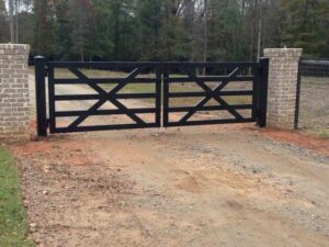 A driveway gate idea with steel or aluminum gate frame, custom made with x braces for extra heavy duty security.