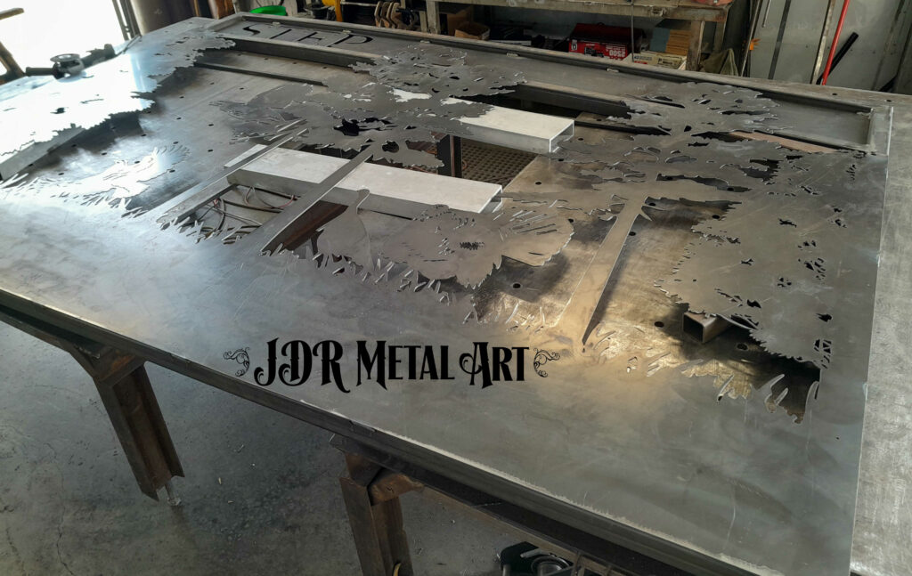 Atlanta driveway gates being fabricated from steel by Atlanta driveway gate supplier JDR Metal Art in Spring 2024.