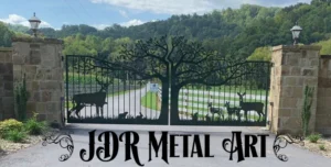Custom Driveway Gates and Custom Gates for Driveway by JDR Metal Art 1 Custom dual-swing driveway gate featuring a handcrafted Smoky Mountain white oak tree design and wildlife silhouettes for a Tennessee estate.