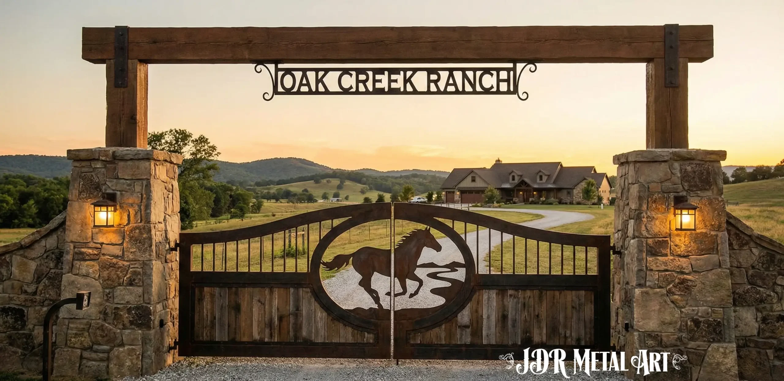 Custom ranch entrance gate with overhead metal sign reading Oak Creek Ranch