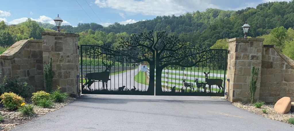 Knoxville TN Custom Driveway Gates | JDR Metal Art (Horse Theme, Steel Frame & Rough Sawn Cedar) 7 Custom dual swing driveway gate featuring an intricate plasma cut oak tree canopy with a whitetail buck and wildlife on a luxury estate entry.