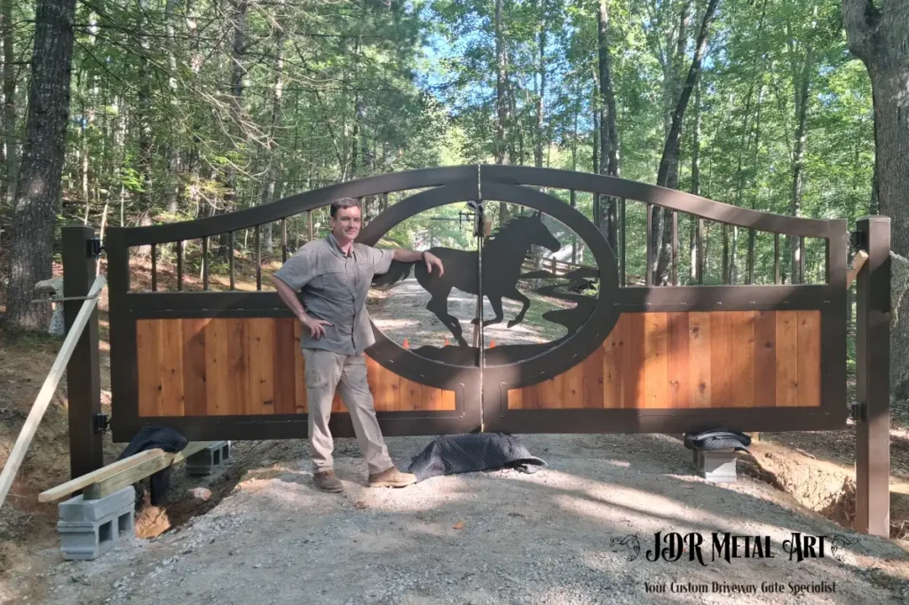 Knoxville TN Custom Driveway Gates | JDR Metal Art (Horse Theme, Steel Frame & Rough Sawn Cedar) 1 Finished Knoxville TN custom driveway gates with horse silhouette design and cedar inlay.