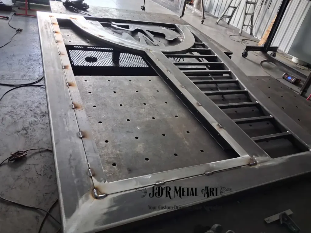 Knoxville TN Custom Driveway Gates | JDR Metal Art (Horse Theme, Steel Frame & Rough Sawn Cedar) 3 Steel gate frame with horse silhouette cutout in progress at JDR Metal Art fabrication shop.