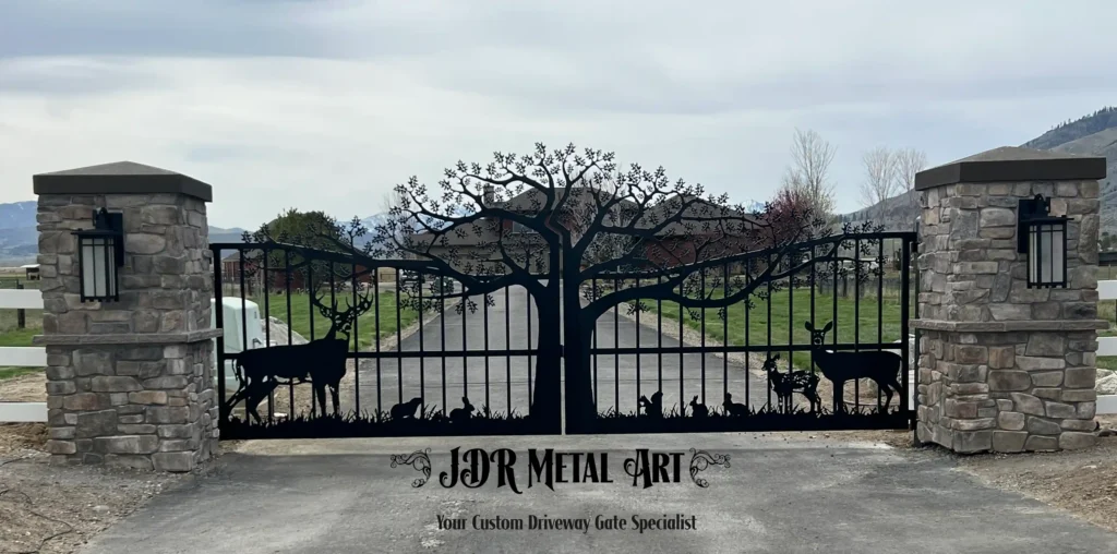 Carson City Custom Driveway Gates - Wildlife & Tree Theme 1 Carson City NV custom driveway gates with steel construction of metal oak tree with plasma cut deer and wildlife theme.